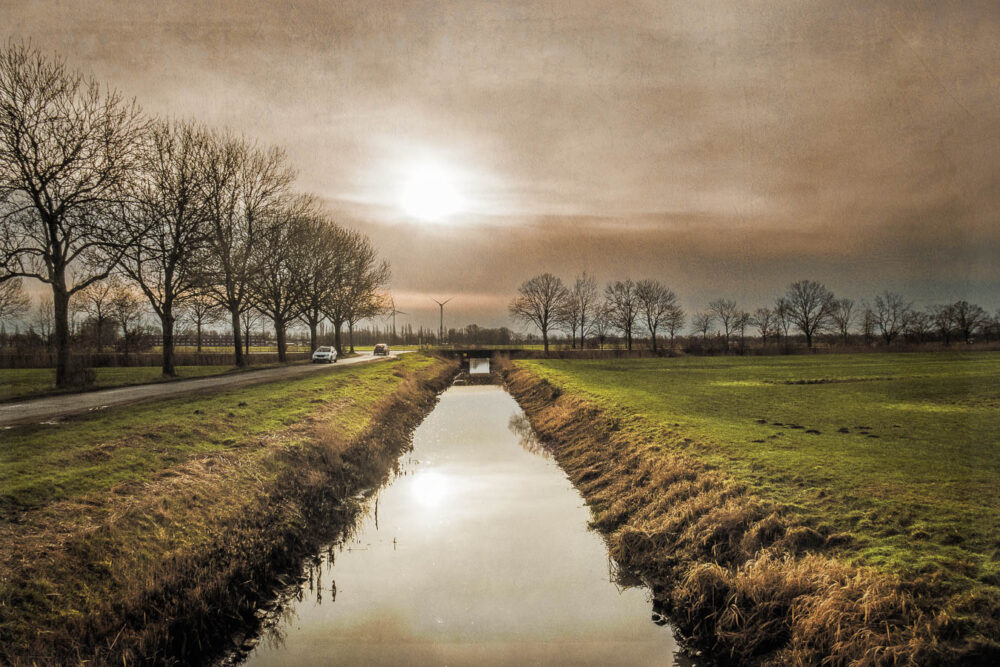 Sonnenaufgang am Neuengammer Sammelgraben.