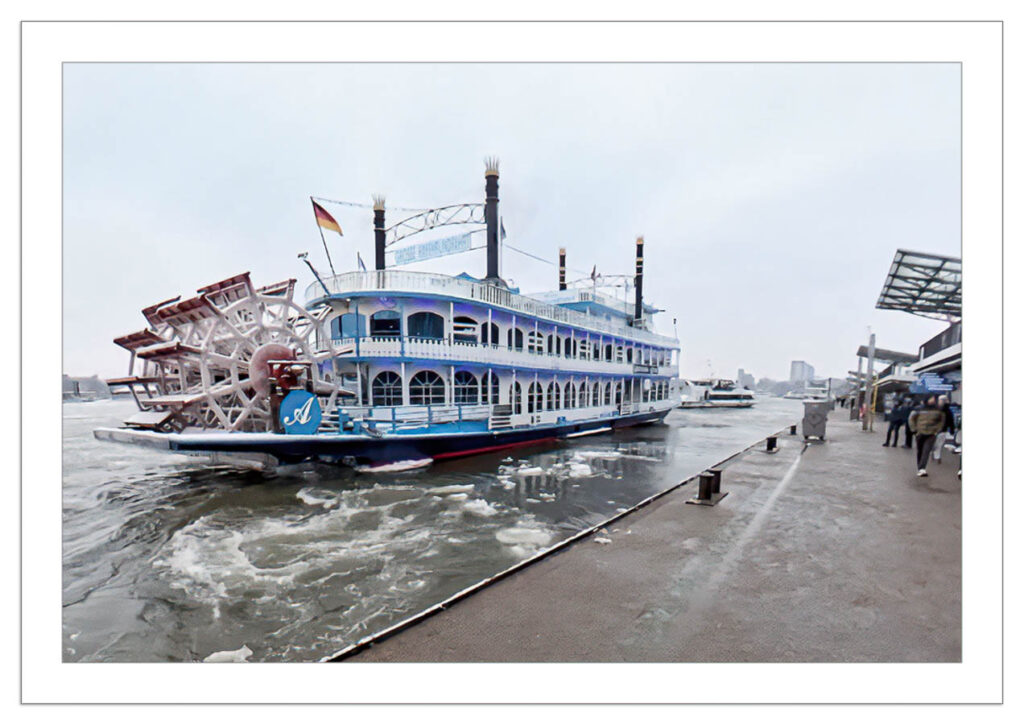 Ablegemanöver des Raddampfers an den Landungsbrücken in Hamburg.